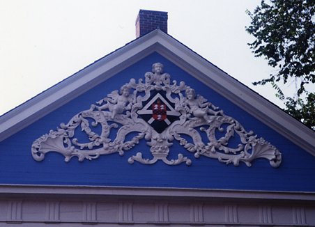 Holden Chapel facade wood carving restoration