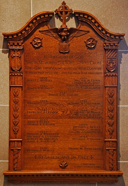 Hand carved dedication plaque with ornament and lettering
