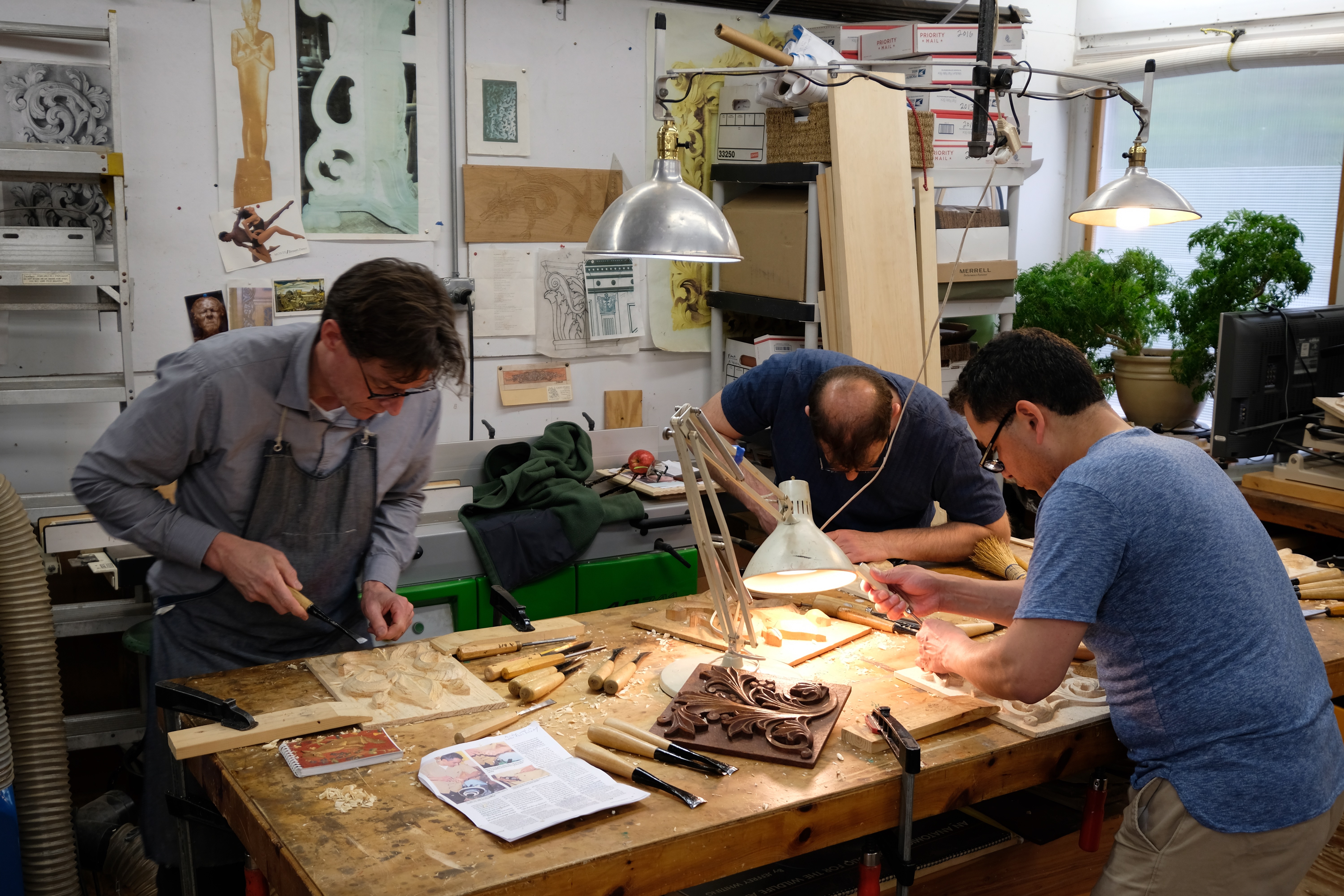Students learning wood carving at Calvo Studio