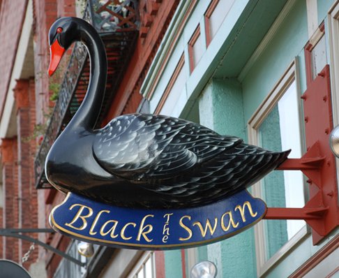 Custom hand carved sign in Mahogany