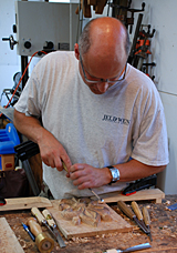 Student learning how to carve a design