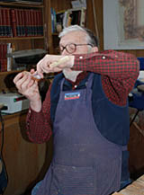 student works on learning wood carving tool sharpening